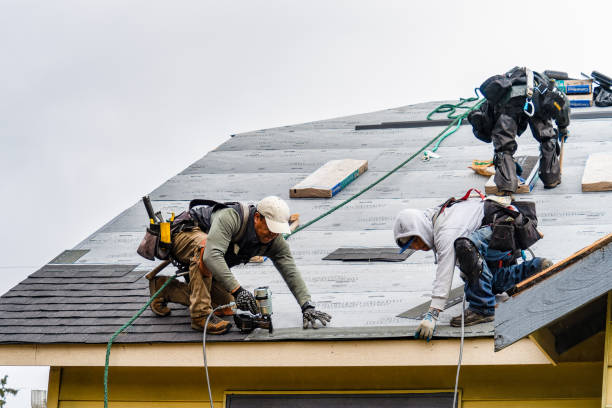 Professional Emergency Roof Repair technician working in Otterbein, IN
